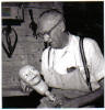 One of the last pictures of Frank Marshall holding a ventriloquist dummy head